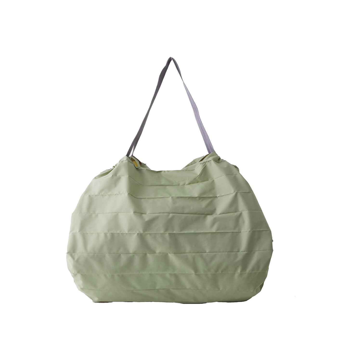 Image of  El Fluye Bag by Shupatto es el bolso inteligente con Japanese One-Pull Tech, que se expande con un solo movimiento y se pliega en segundos. Color Mori.